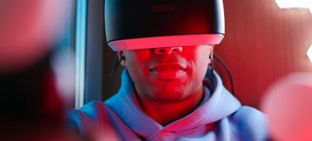 Young man wearing VR helmet, IS PORN BAD